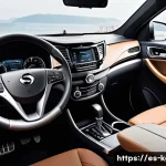 쌍용 토레스의 내부 디자인 변화 - A luxurious car interior showcasing the SsangYong Torres premium cabin with soft-touch synthetic lea...